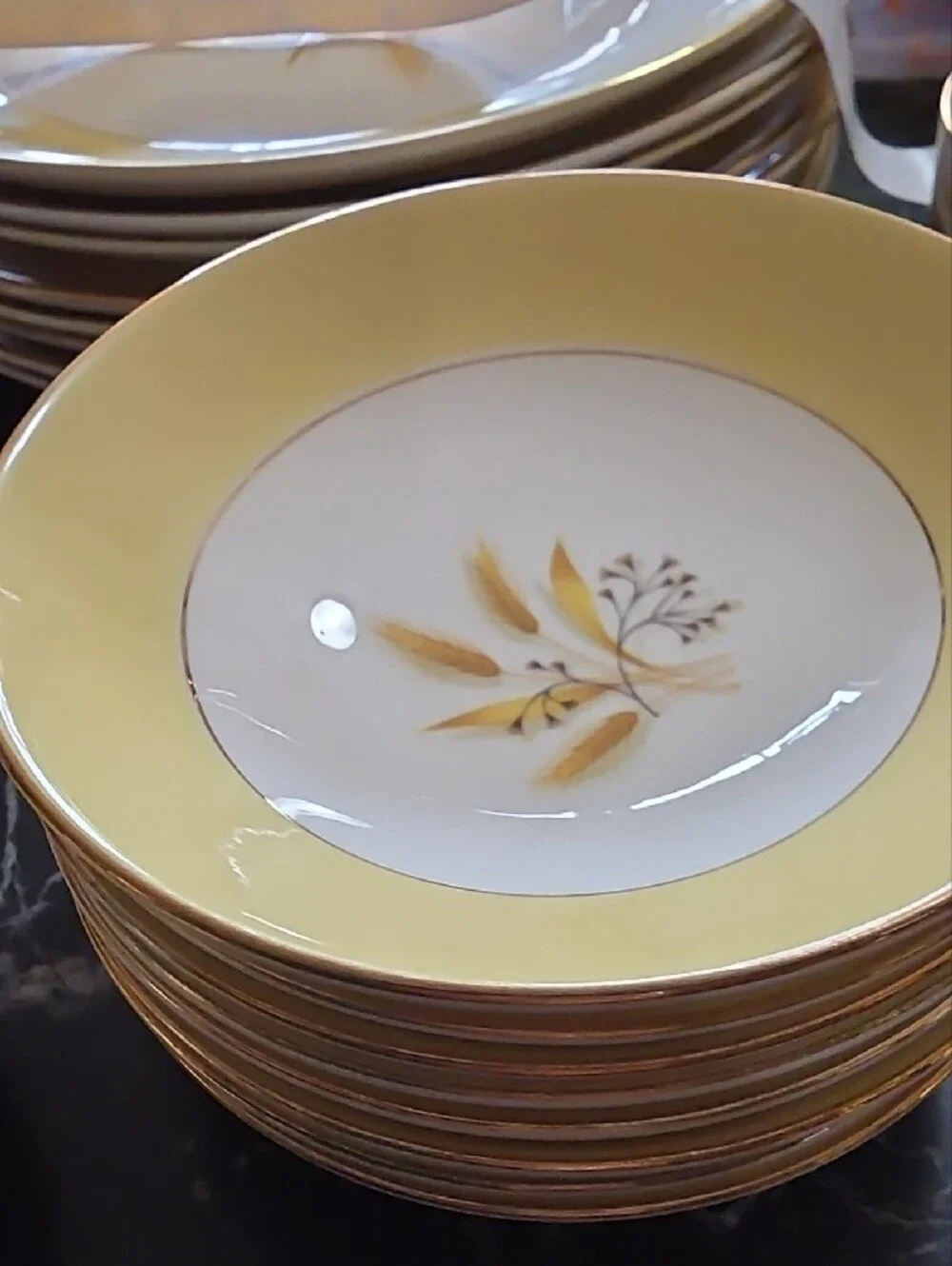 Yellow and White Floral Dinnerware with Gold Trim Accents